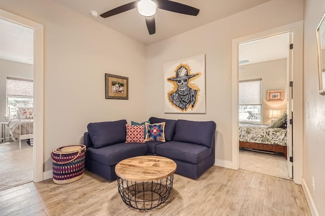 100 Gabgrove Ct, Georgetown, TX 78633 - sitting room with light wood-type flooring, plenty of natural light, and ceiling fan