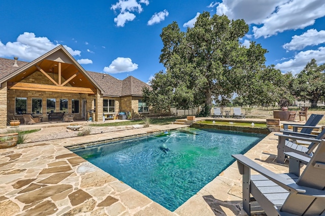 view of pool with a patio