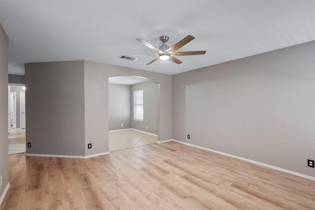 unfurnished room with ceiling fan and light hardwood / wood-style flooring