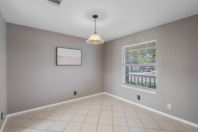 view of tiled empty room