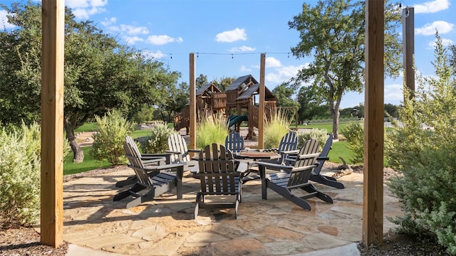 view of patio with a playground