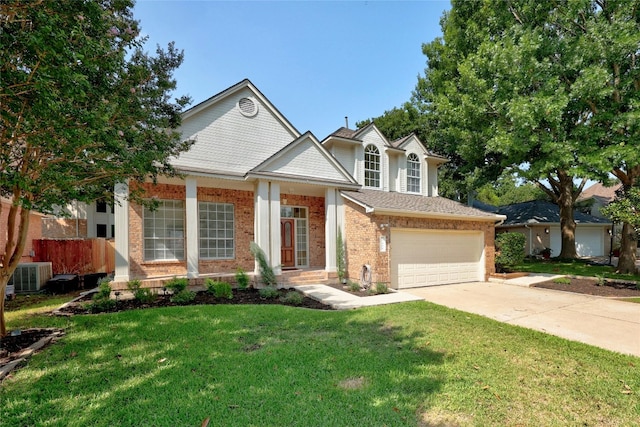 view of front of house featuring central AC unit, a garage, and a front yard