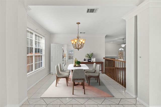 dining space featuring light tile patterned flooring, ceiling fan with notable chandelier, and crown molding