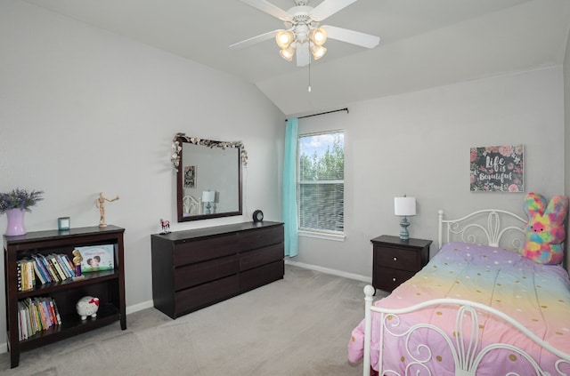 carpeted bedroom with ceiling fan and lofted ceiling