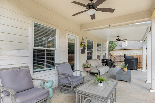 view of patio / terrace with ceiling fan and outdoor lounge area