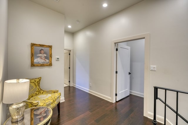 corridor with dark wood-type flooring