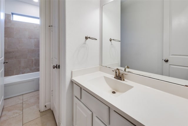 bathroom with shower / bath combination, tile patterned flooring, and vanity