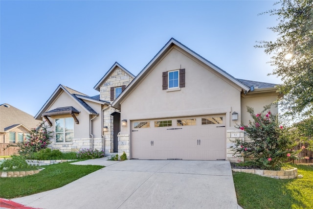 view of front of property with a garage