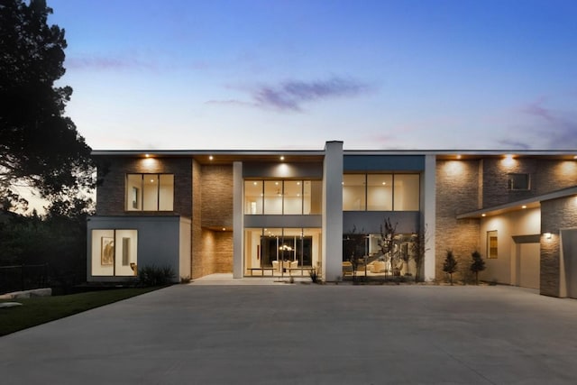 view of front of home with concrete driveway