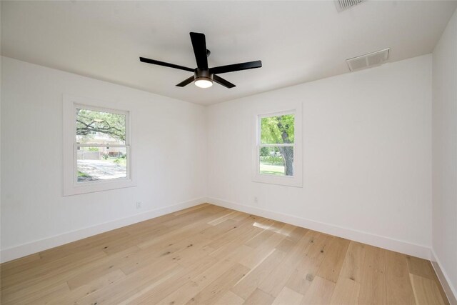 1928 Miles Ave Unit 1, Austin, TX 78745 - unfurnished room featuring light wood finished floors and ceiling fan