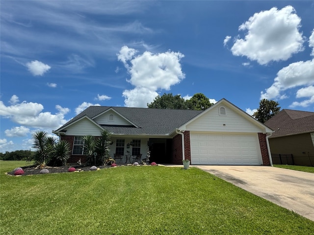 ranch-style home with a front yard and a garage