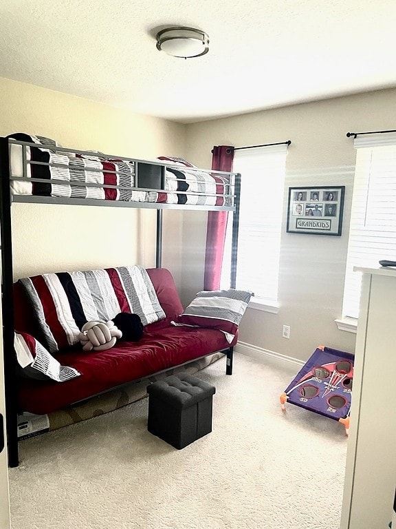 bedroom featuring carpet flooring