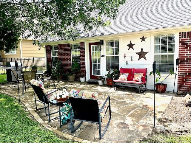 view of patio / terrace with area for grilling and an outdoor hangout area