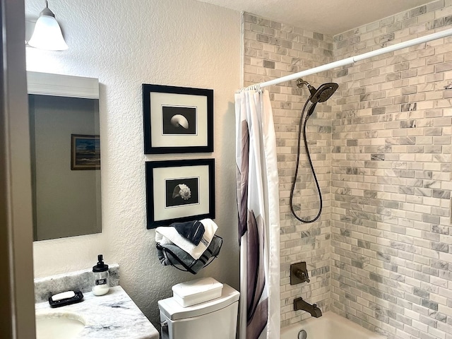 bathroom featuring shower / tub combo with curtain and toilet