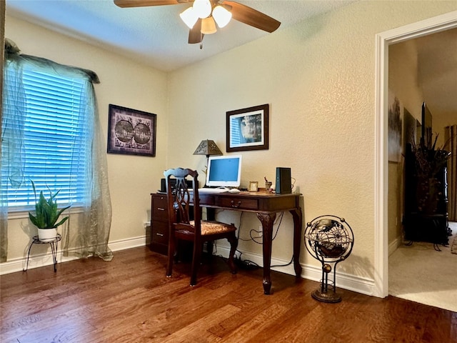 office space featuring ceiling fan and wood-type flooring