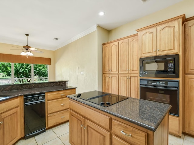 kitchen featuring ceiling fan, black appliances, light tile patterned floors, and a kitchen island