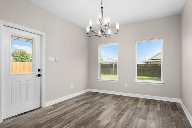 interior space featuring an inviting chandelier and wood-type flooring