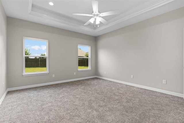 unfurnished room featuring ceiling fan, recessed lighting, baseboards, carpet, and a raised ceiling