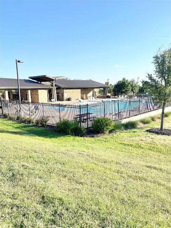 exterior space featuring a community pool