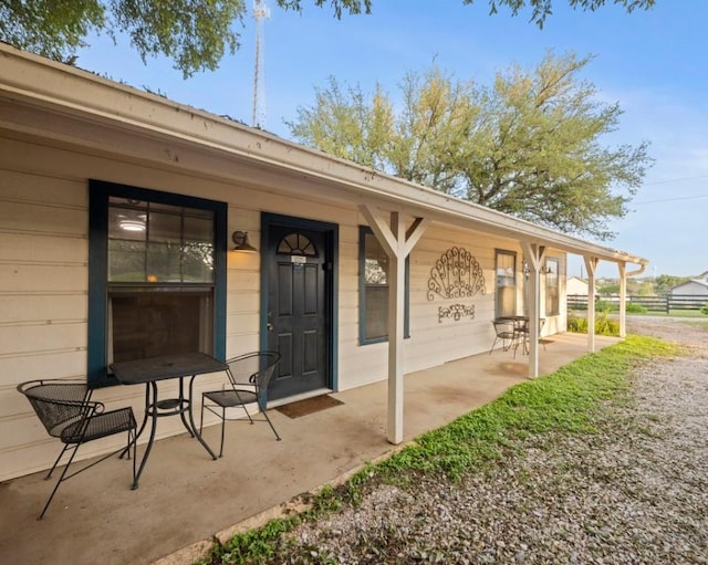 doorway to property with a porch