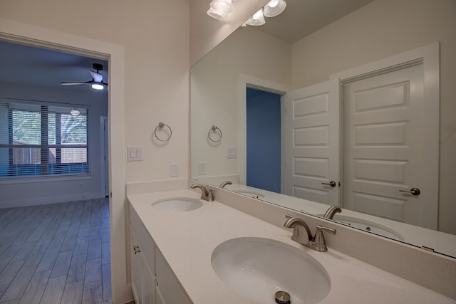 bathroom with vanity and ceiling fan