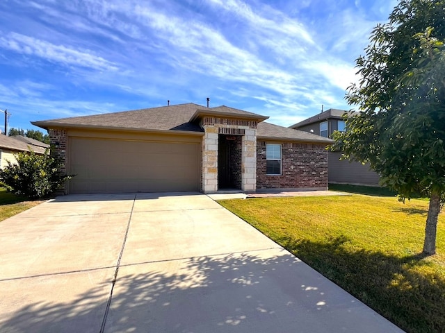 view of front facade with a garage and a front lawn