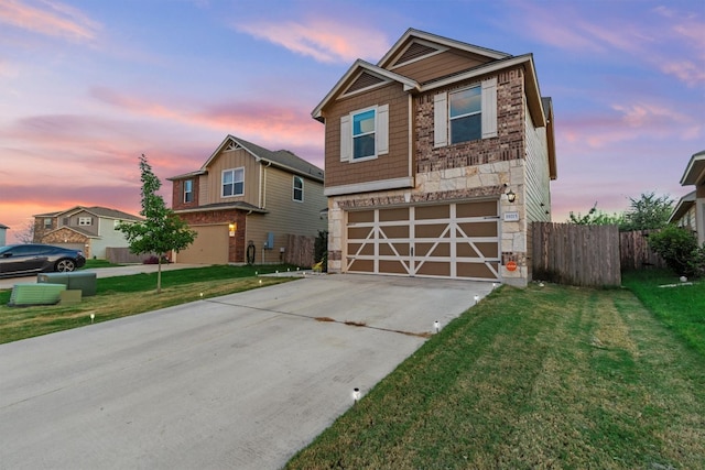 craftsman-style house with a yard and a garage