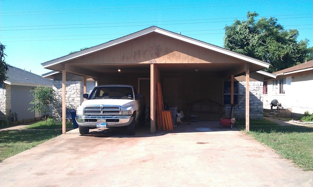 garage with a carport