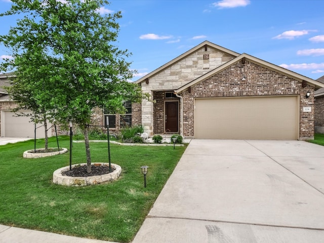 craftsman-style house with a front yard and a garage