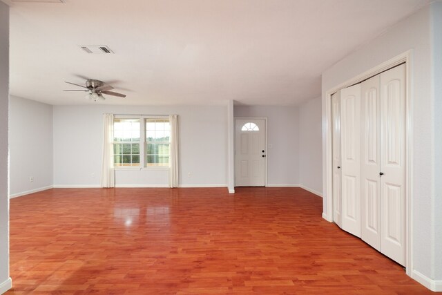 interior space with light hardwood / wood-style flooring and ceiling fan