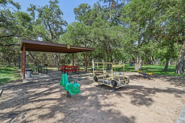 view of property's community featuring a playground