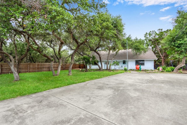 view of front of home with a front lawn