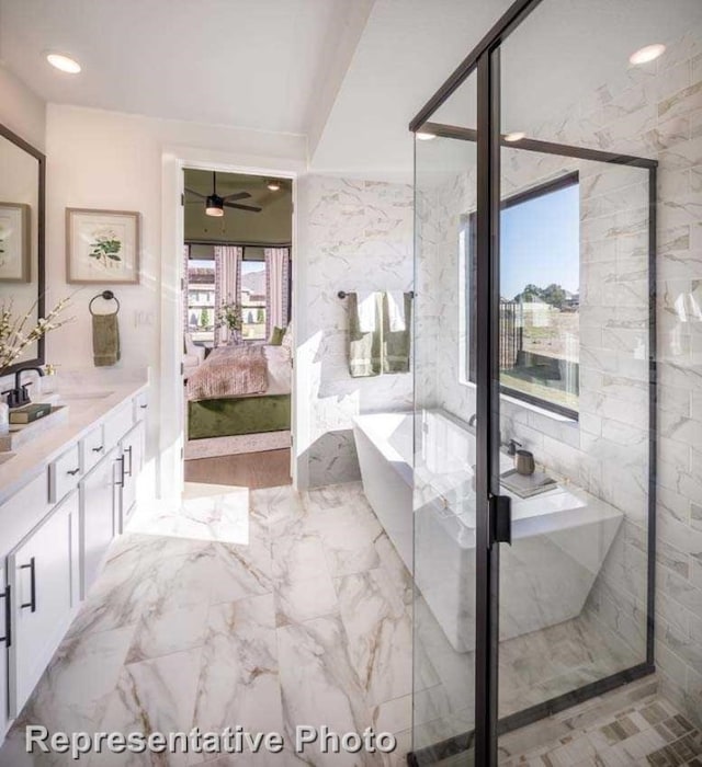 bathroom featuring plus walk in shower, ceiling fan, and vanity