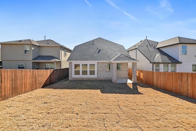 back of property with a patio area