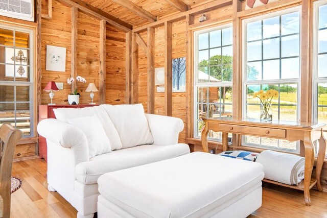 interior space featuring wooden ceiling, a wealth of natural light, and lofted ceiling with beams