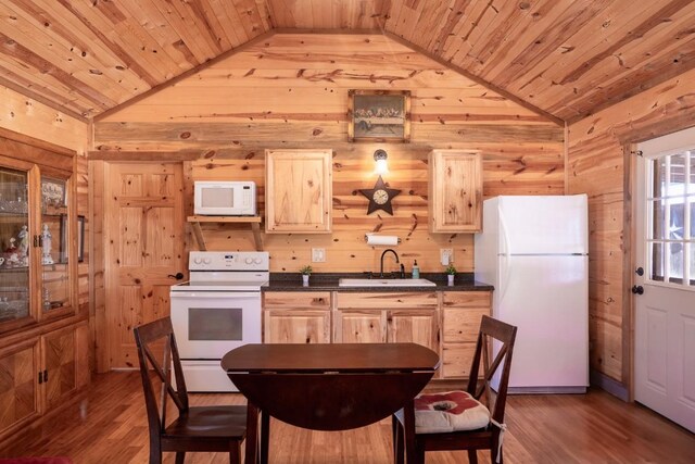 kitchen featuring hardwood / wood-style floors, sink, white appliances, light brown cabinets, and wood ceiling