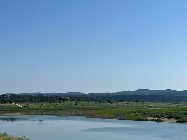 view of water feature featuring a rural view and a mountain view