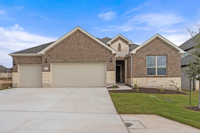 ranch-style home featuring an attached garage, stone siding, a front lawn, and concrete driveway