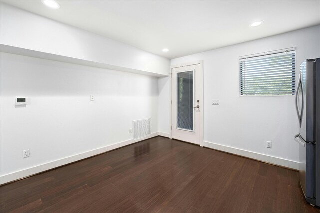 empty room featuring hardwood / wood-style flooring