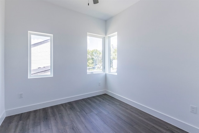 empty room with ceiling fan and wood-type flooring