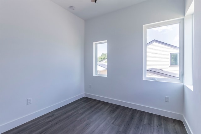 empty room featuring hardwood / wood-style flooring