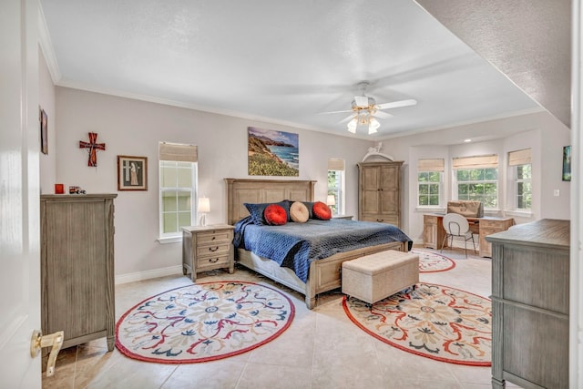 tiled bedroom featuring ceiling fan, a textured ceiling, and ornamental molding