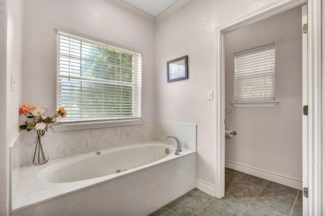 bathroom featuring a tub, tile patterned flooring, and crown molding