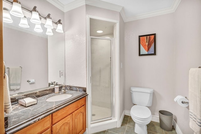 bathroom with vanity, tile patterned floors, toilet, and a shower with door