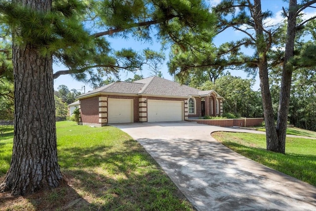 ranch-style home with a garage and a front yard