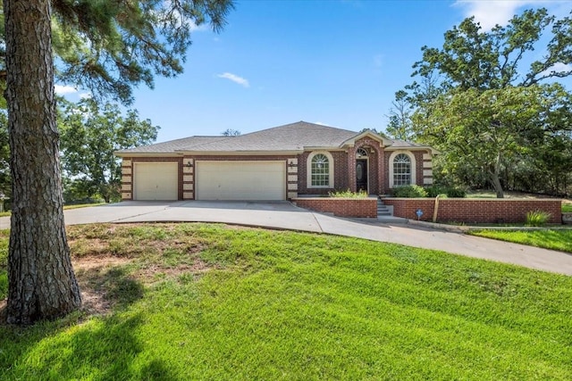 ranch-style home featuring a front lawn and a garage