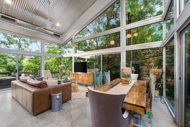 sunroom / solarium featuring visible vents, an outdoor hangout area, and outdoor dining area