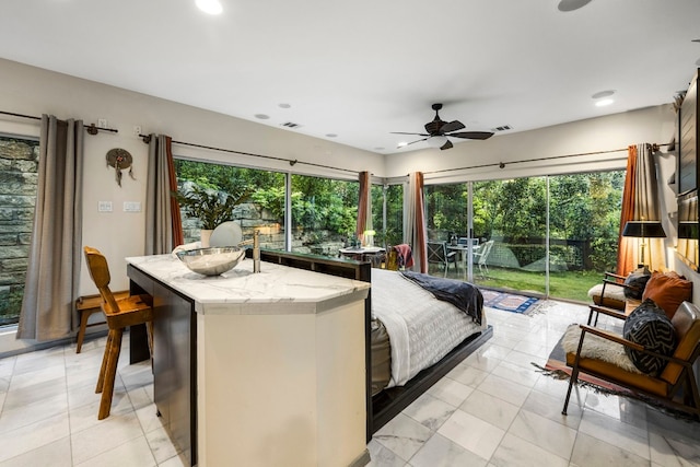 bedroom featuring recessed lighting, access to exterior, and visible vents