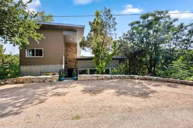 3025 Geronimo Trl, Austin, TX 78734 - view of home's exterior with stone siding