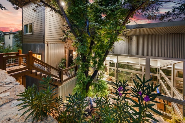 view of property exterior at dusk